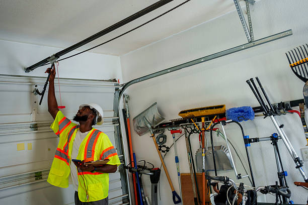 Professional Garage Door Panel Replacement technician working in Hancock County County, ME